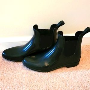 J Crew black rainboots. Some wear.  Smoke & pet free home.
